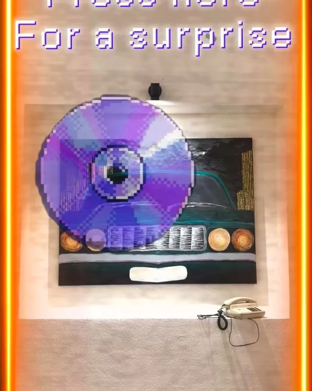 A glowing CD display — Untamed × Nyra