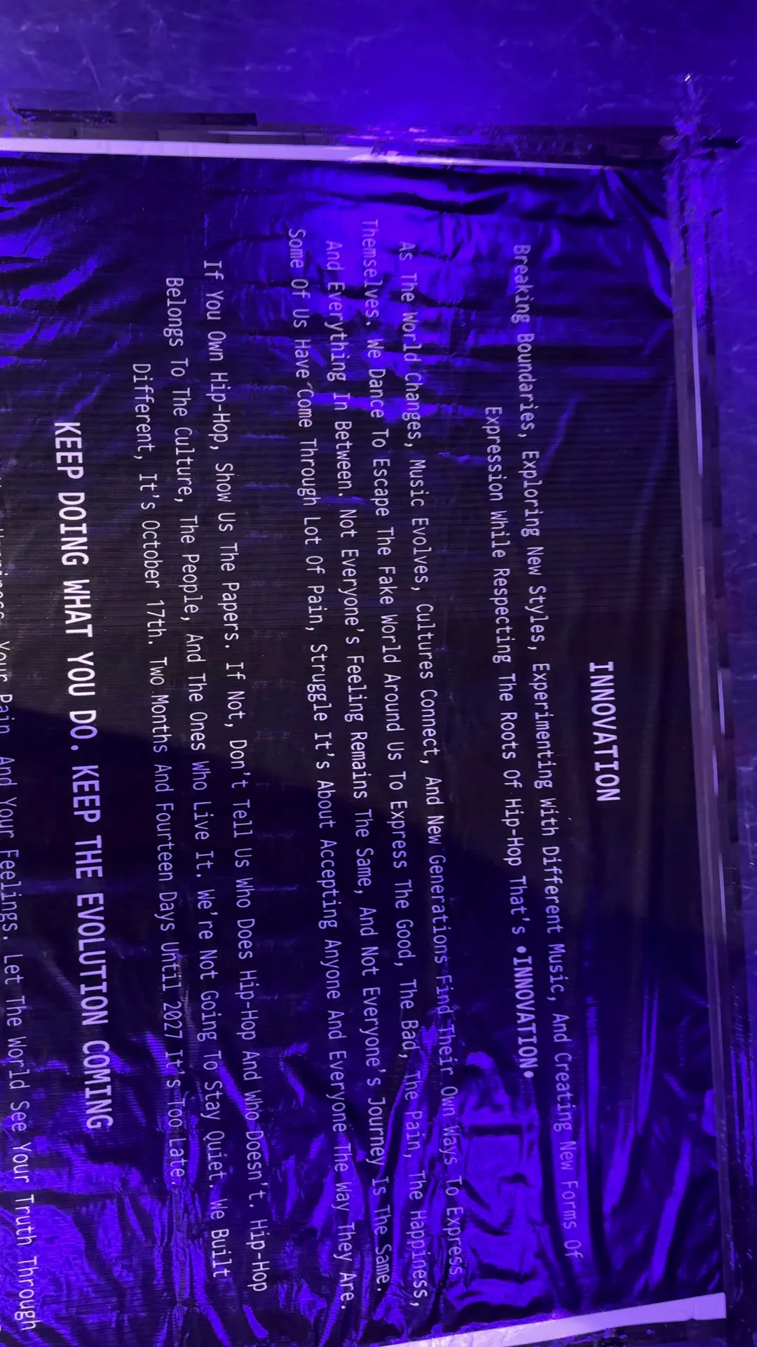 The Innovation manifesto banner lit in purple