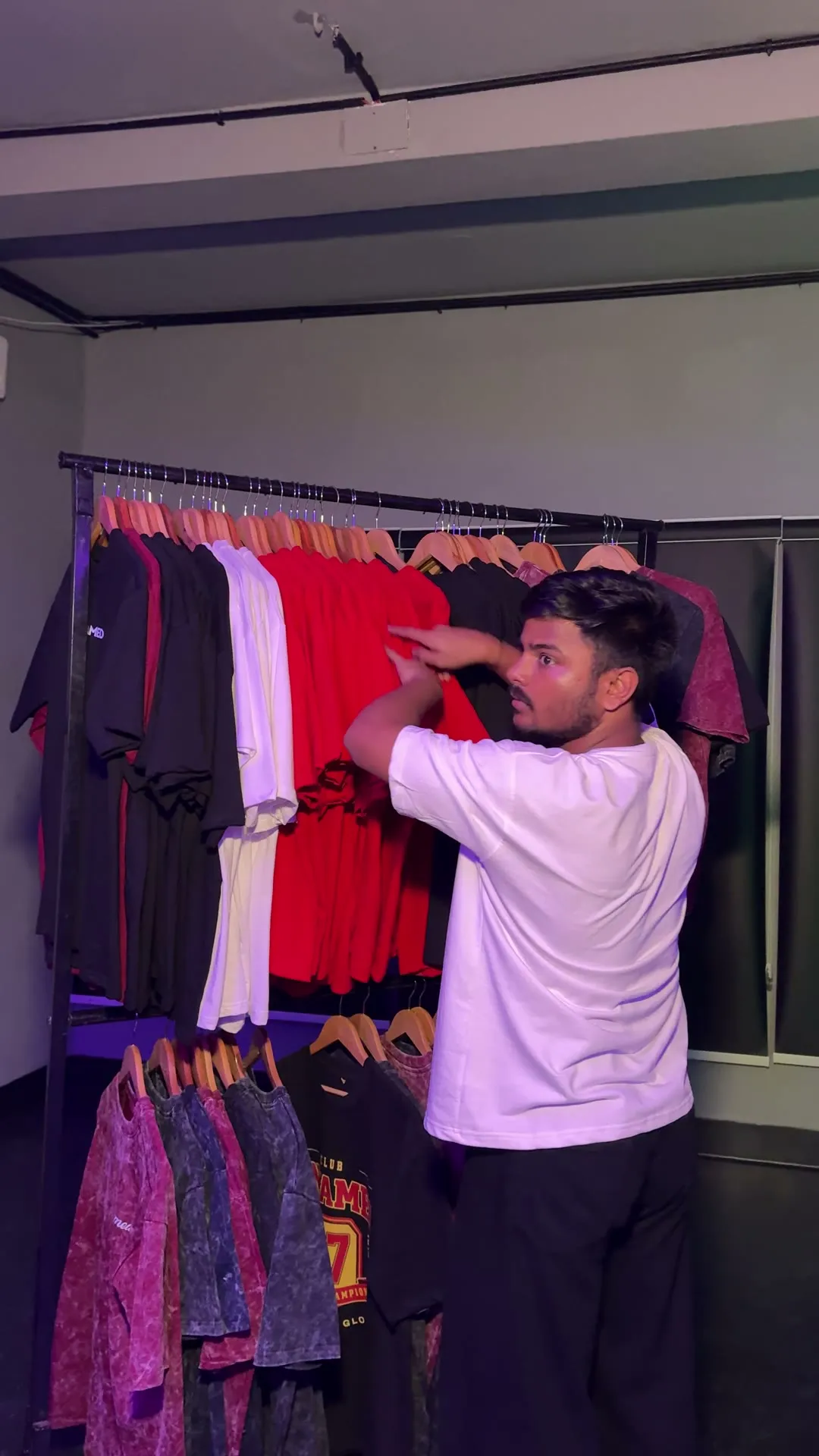 Tees on the Untamed merch rack